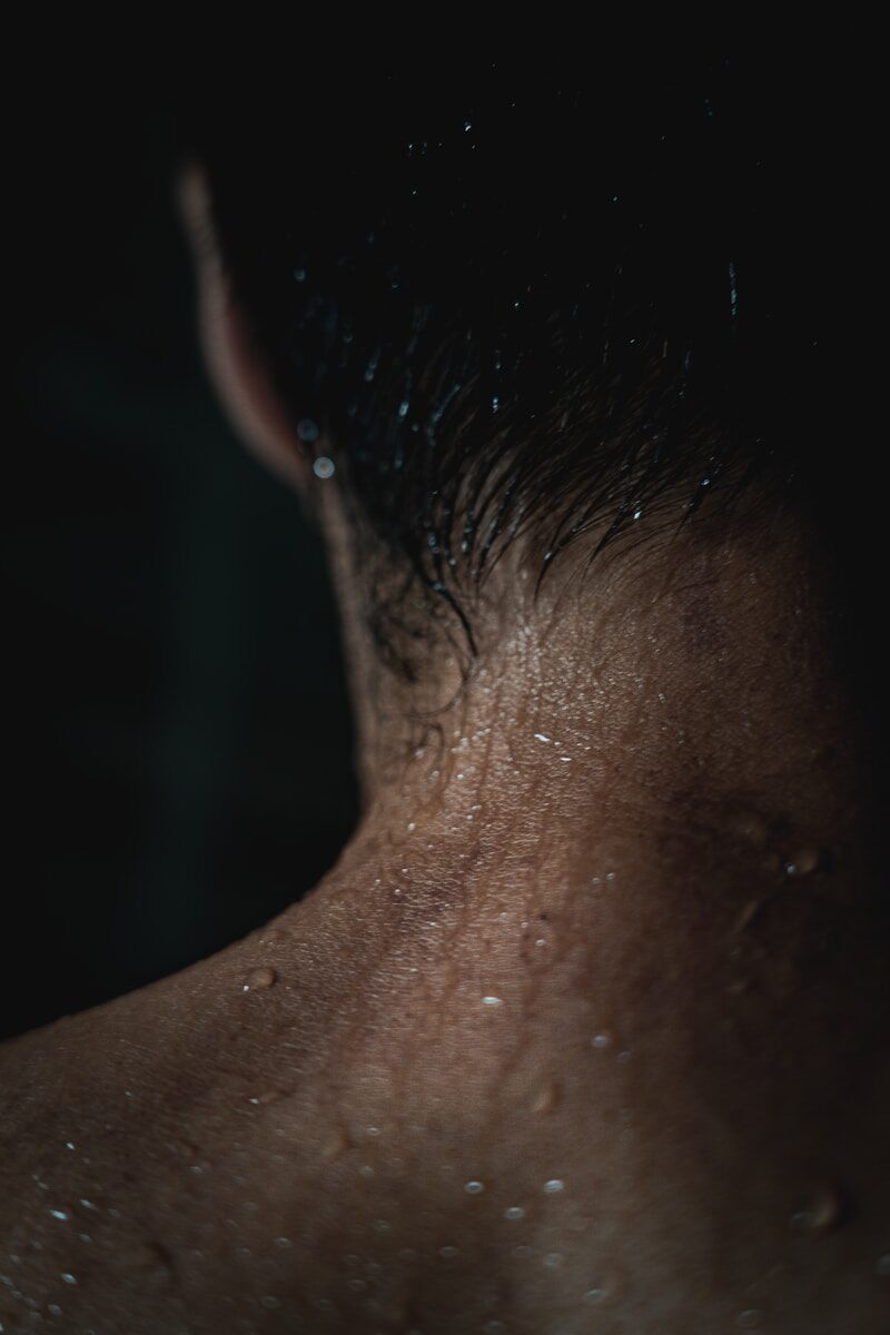 persons head with black hair